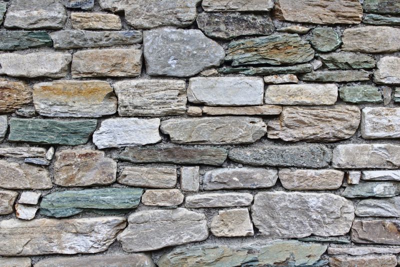 Upgrade Visual Appeal With Professional Stone Siding Installation Service!